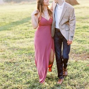Pink Windsor dress with spaghetti straps and slit up to mid-thigh. Size Large.